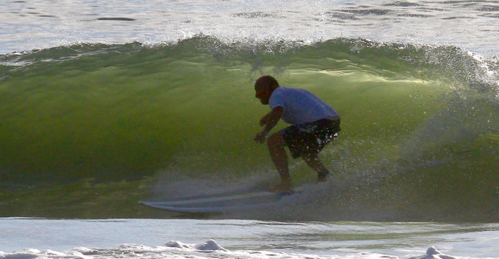 Owner Jim Rodgers still finds time to ride some waves at the North Jetty!